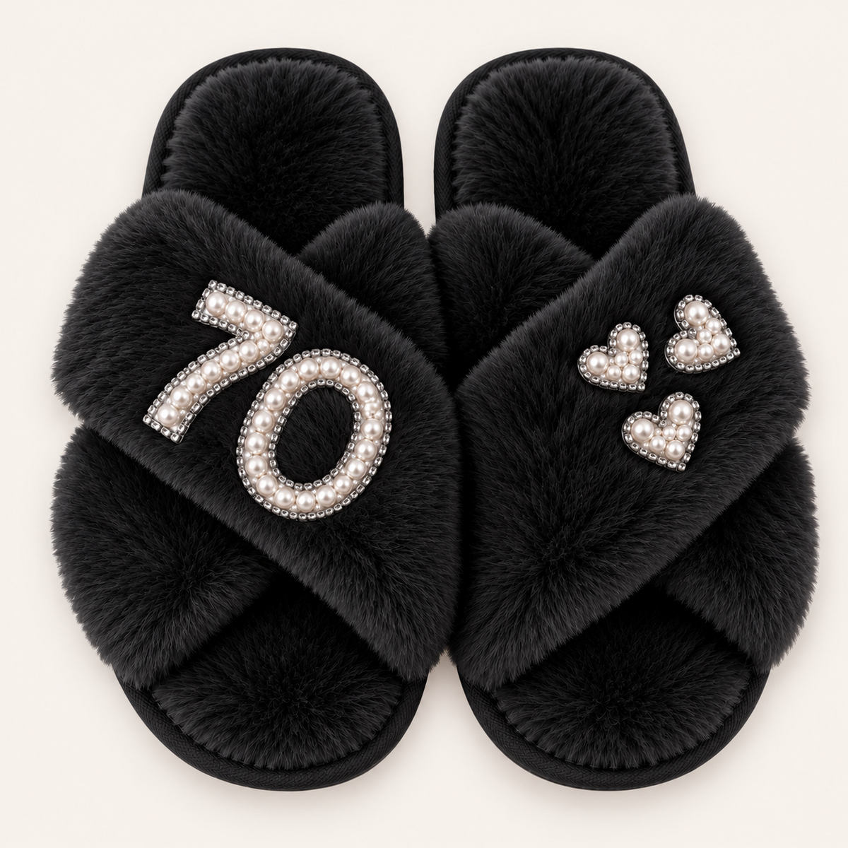 Black faux fur crossover slippers with a pearl number 70, silver trim and three pearl hearts, Grace & Grayson