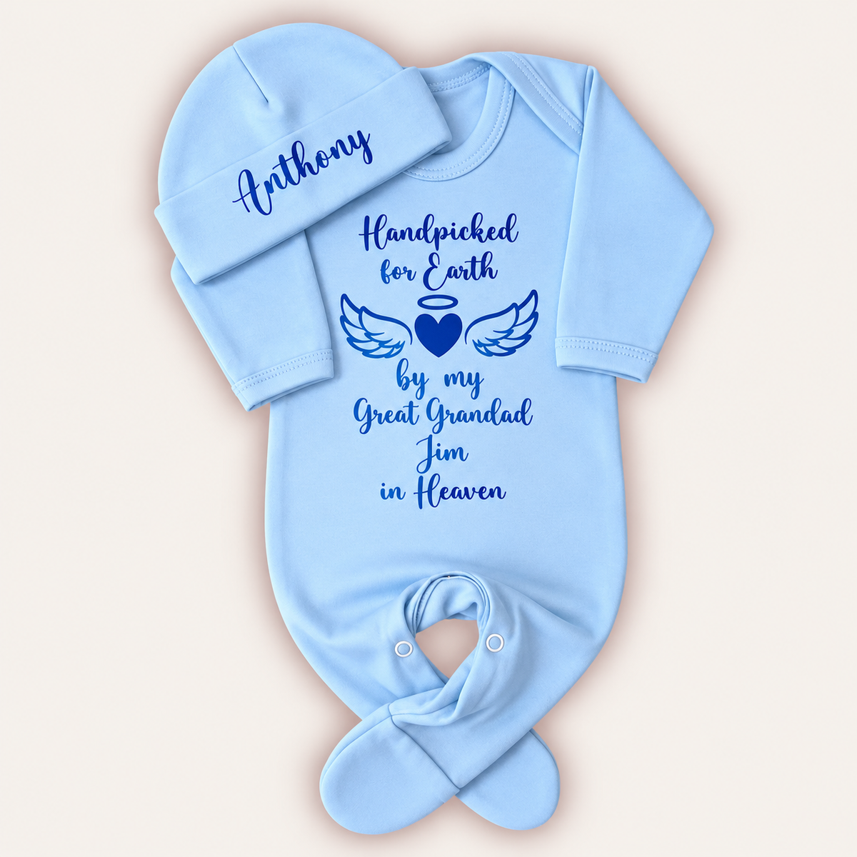 Light blue personalised Handpicked For Earth baby grow and hat with blue angel wings and heart memorial design