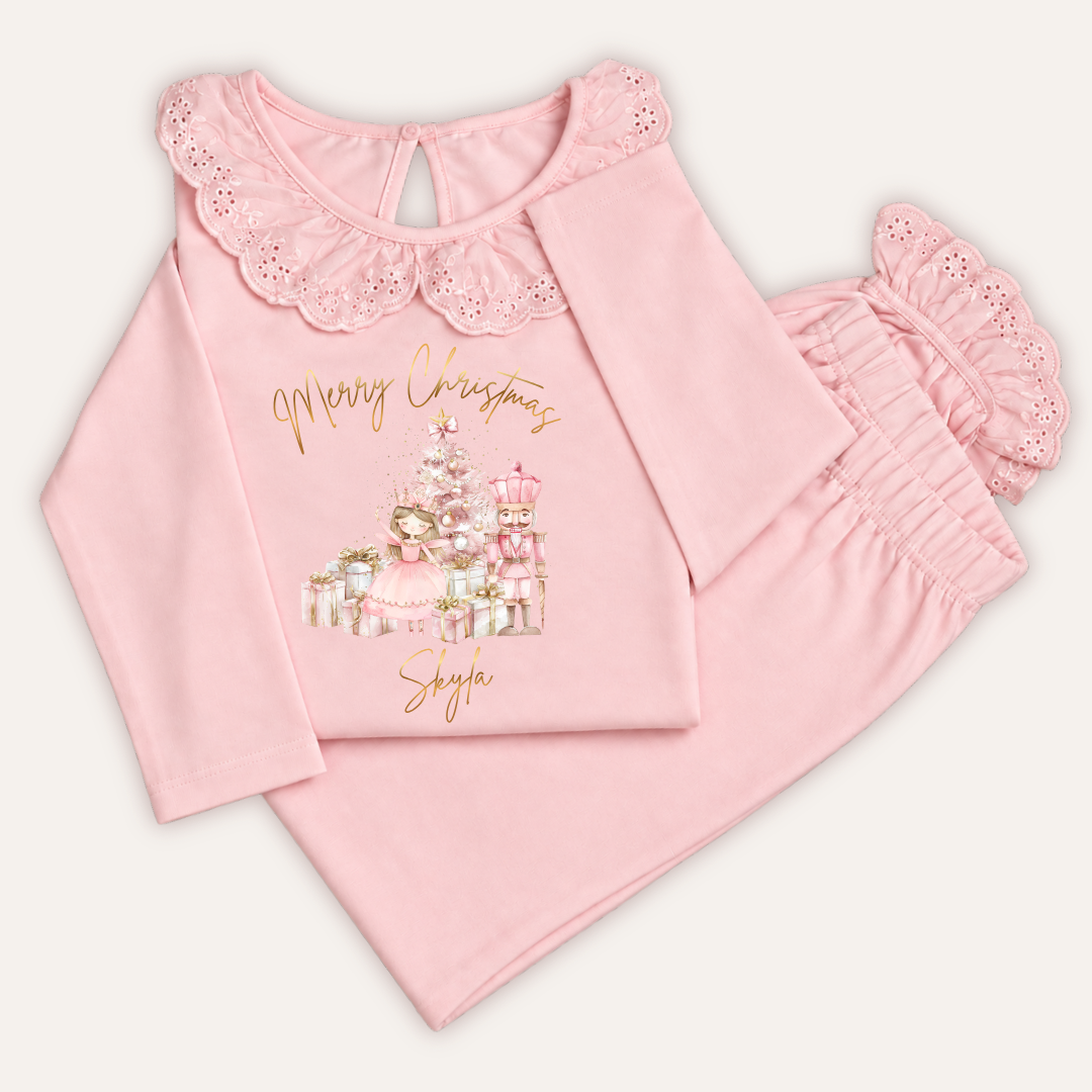 Personalised pink Christmas frill pyjamas featuring Nutcracker and Fairy design by Grace & Grayson