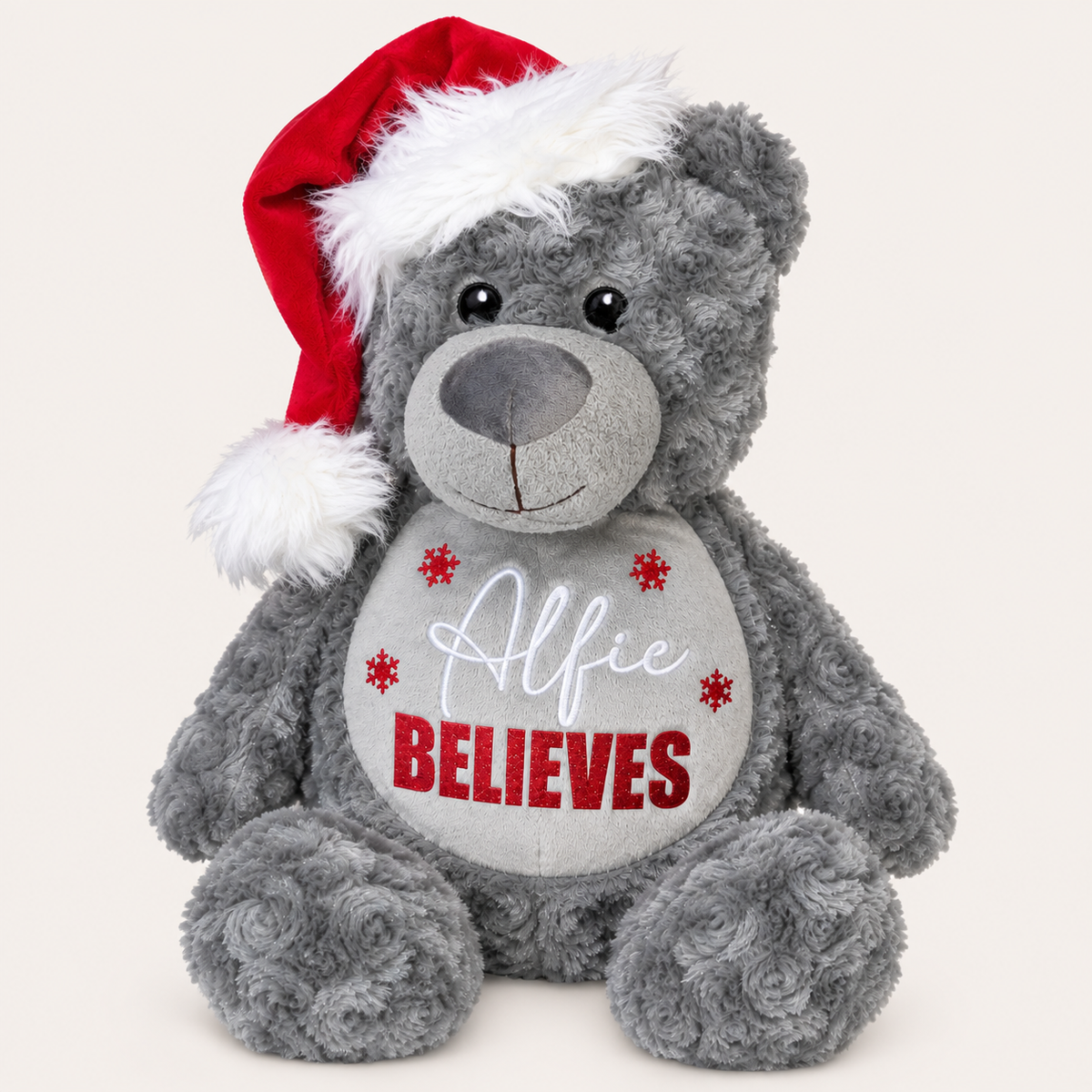 Grey personalised Believes Christmas teddy wearing a Santa hat with white name lettering and snowflake details, Grace & Grayson