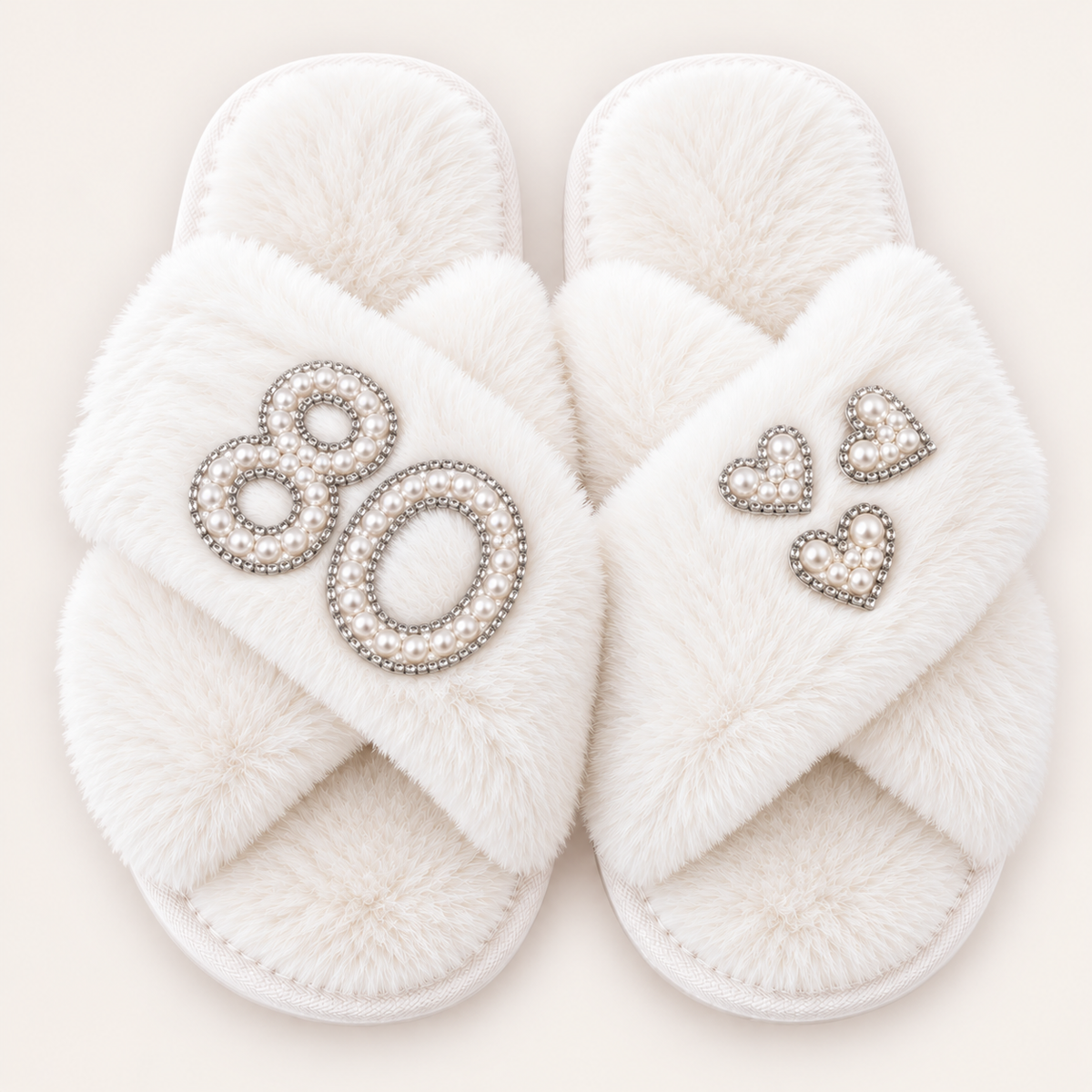 White faux fur crossover slippers with a pearl number 80, silver trim and three pearl hearts, Grace & Grayson