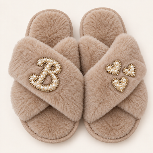 Beige faux fur crossover slippers with a pearl initial and three pearl hearts with gold-tone detailing, Grace & Grayson