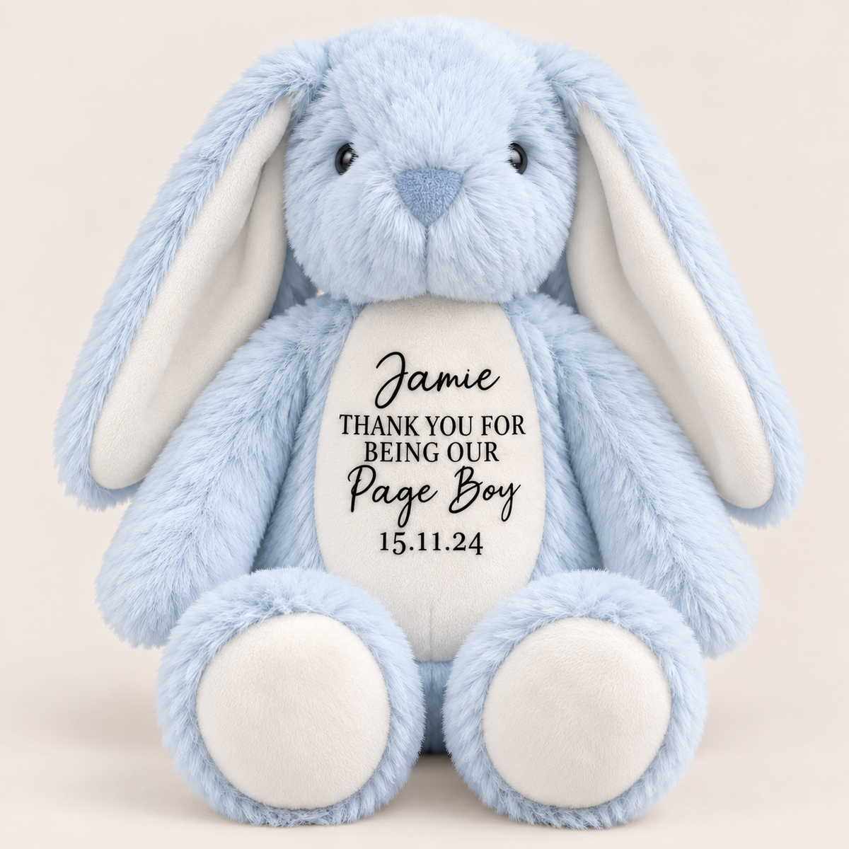 Blue personalised page boy bunny teddy featuring a thank-you message and date on its belly, Grace & Grayson