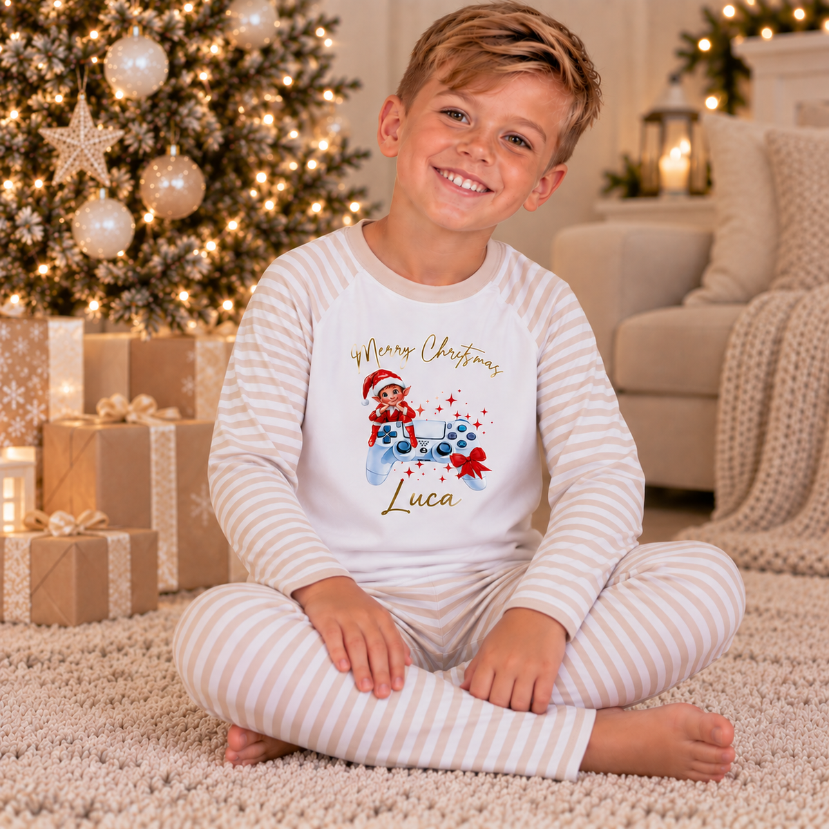 Children’s personalised Gaming Elf Christmas pyjamas featuring festive gaming controller artwork by Grace & Grayson