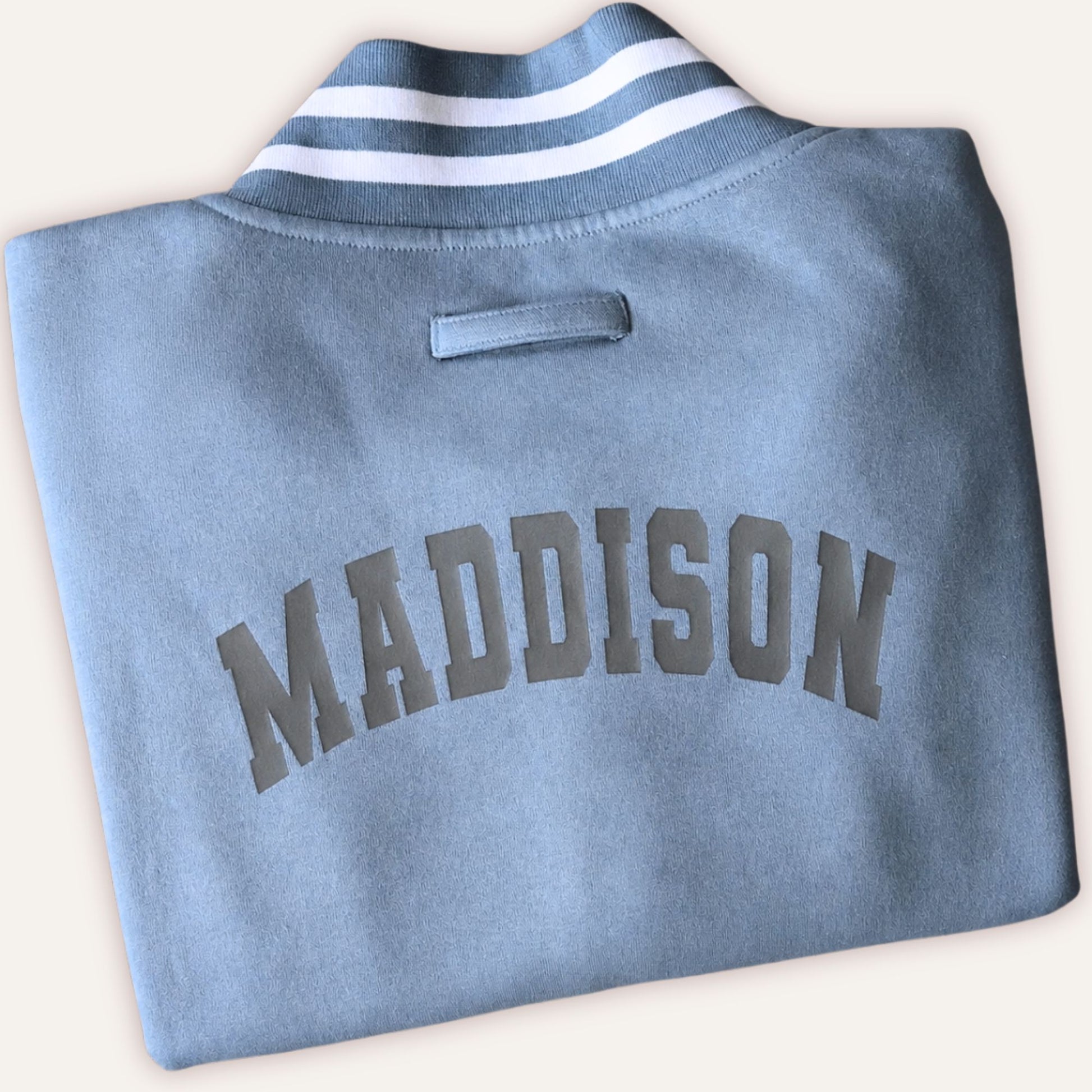 Close-up personalised varsity jacket detail
