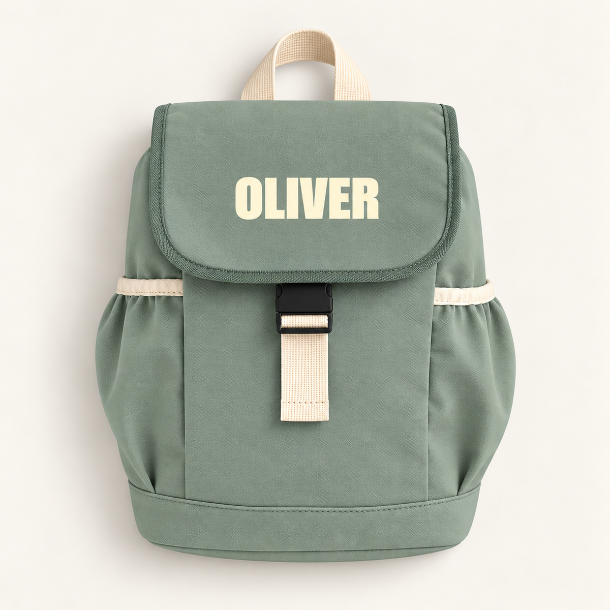 Dusty green personalised children’s backpack with cream block lettering, side pockets and a buckle fastening, Grace & Grayson.