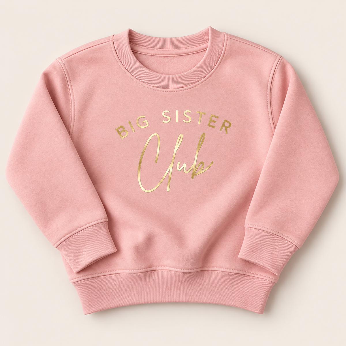 Dusty pink personalised Big Sister Club sweatshirt with gold Big Sister Club lettering, displayed flat, Grace & Grayson ⠋