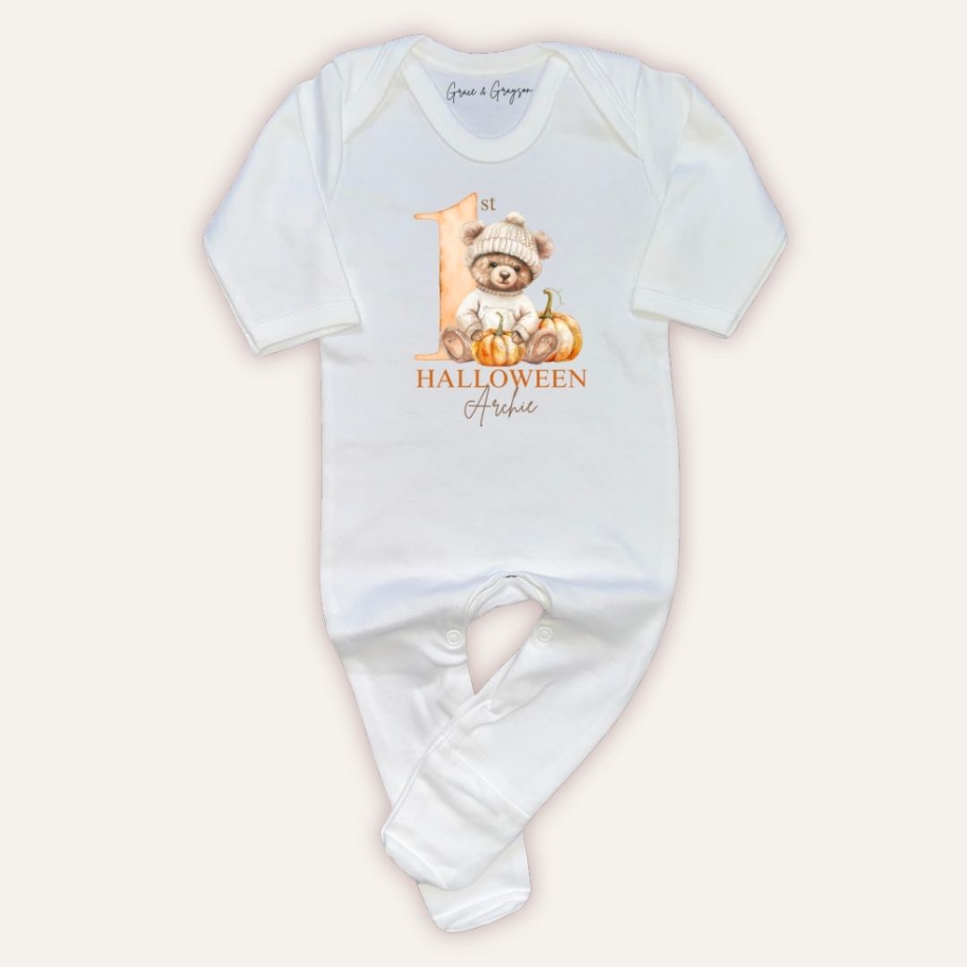 Flat lay of Grace & Grayson personalised 1st Halloween pumpkin bear baby grow with custom name print