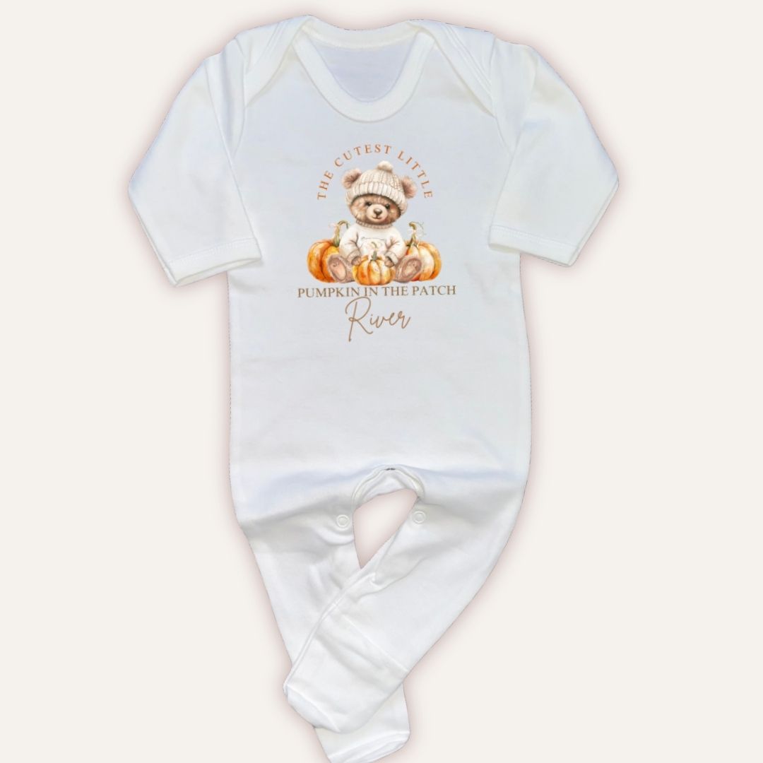 Flat lay of Grace & Grayson personalised cutest little pumpkin in the patch white baby grow with custom name print