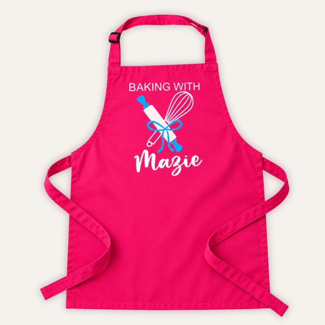 Hot pink personalised adult baking apron with “Baking With” text, rolling pin and whisk design on a white background, Grace & Grayson