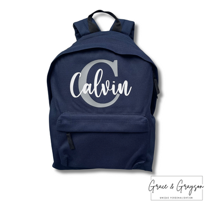  "Kids personalised backpack with initial detail"