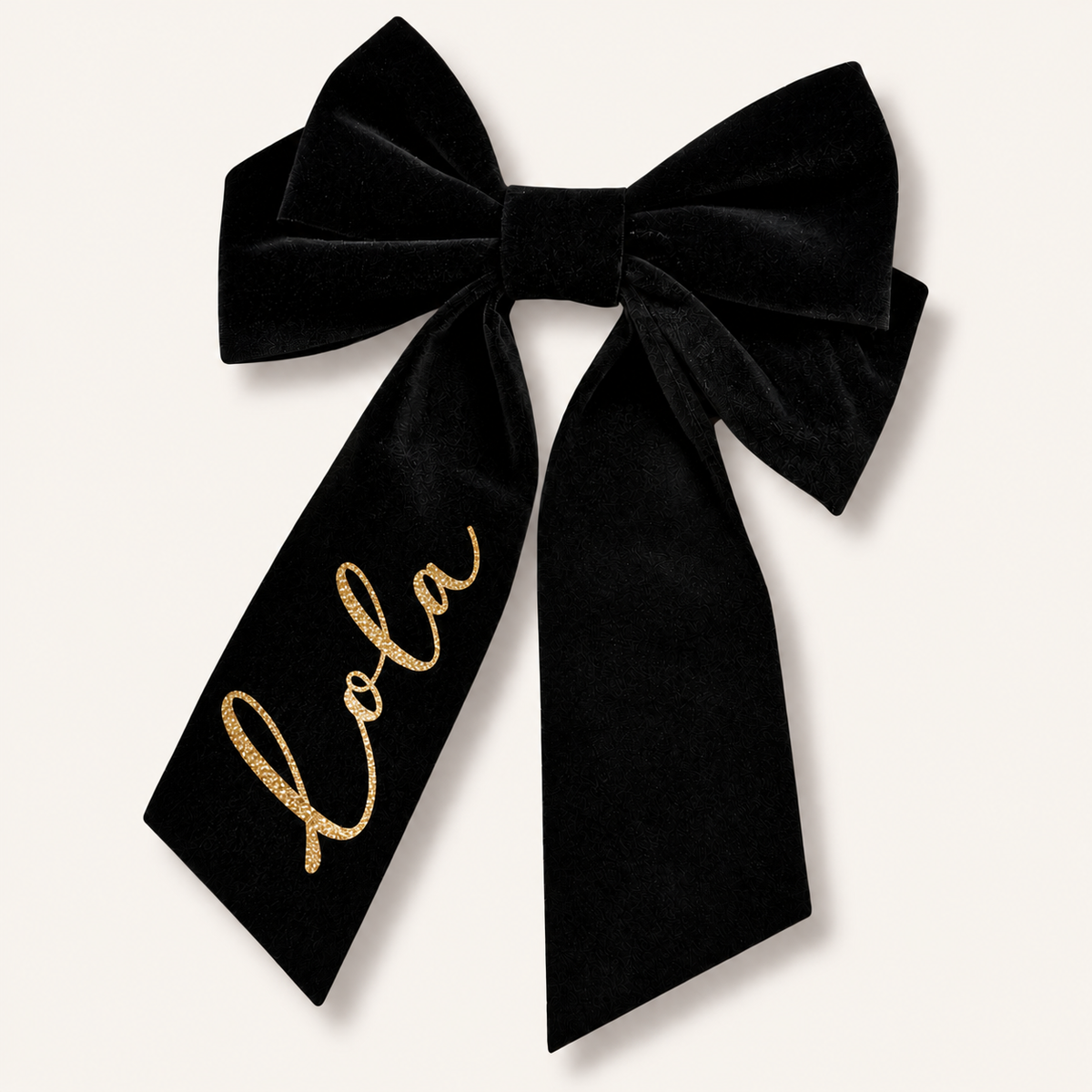 Large black velvet hair bow with long tails and gold glitter personalised lettering, Grace & Grayson.