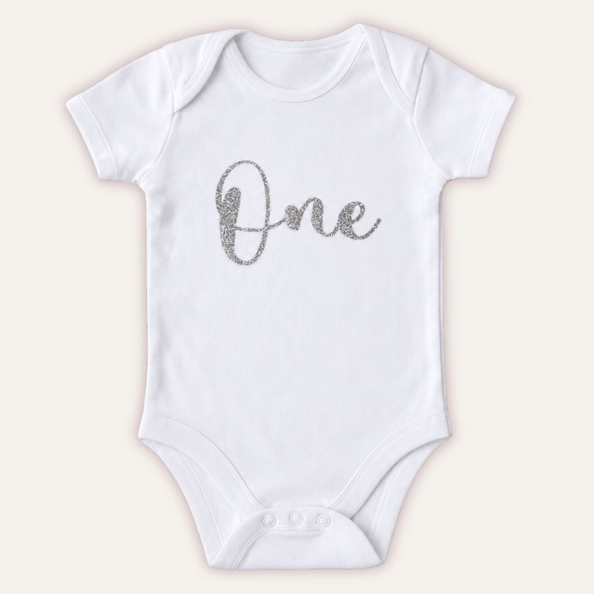 Personalised 1st birthday baby vest with silver glitter One design on white bodysuit - Grace & Grayson