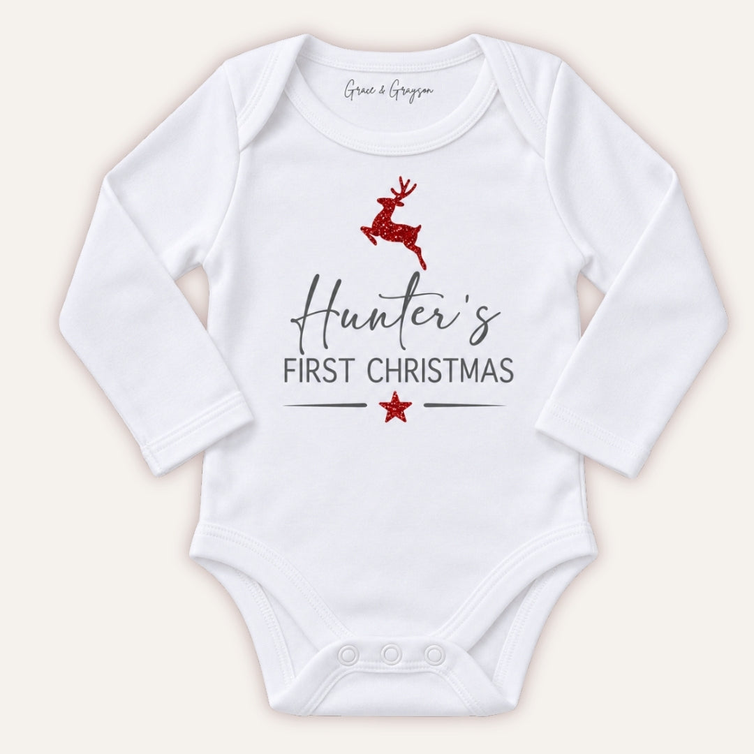 Personalised First Christmas baby vest featuring one of two festive designs, Grace & Grayson.