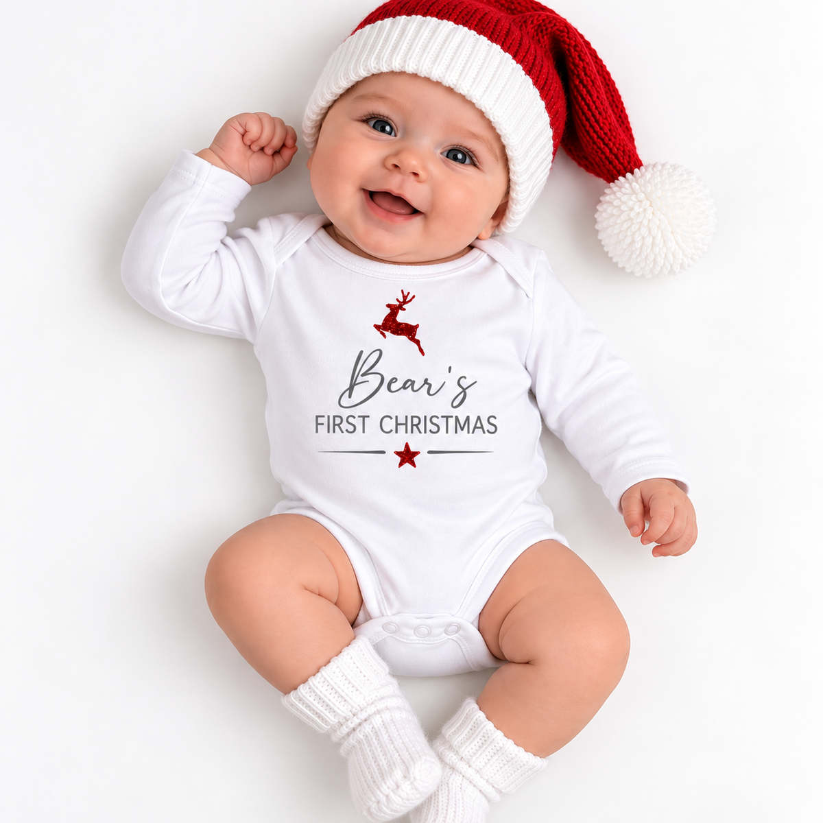 Personalised First Christmas baby vest in a festive Christmas design, Grace & Grayson.