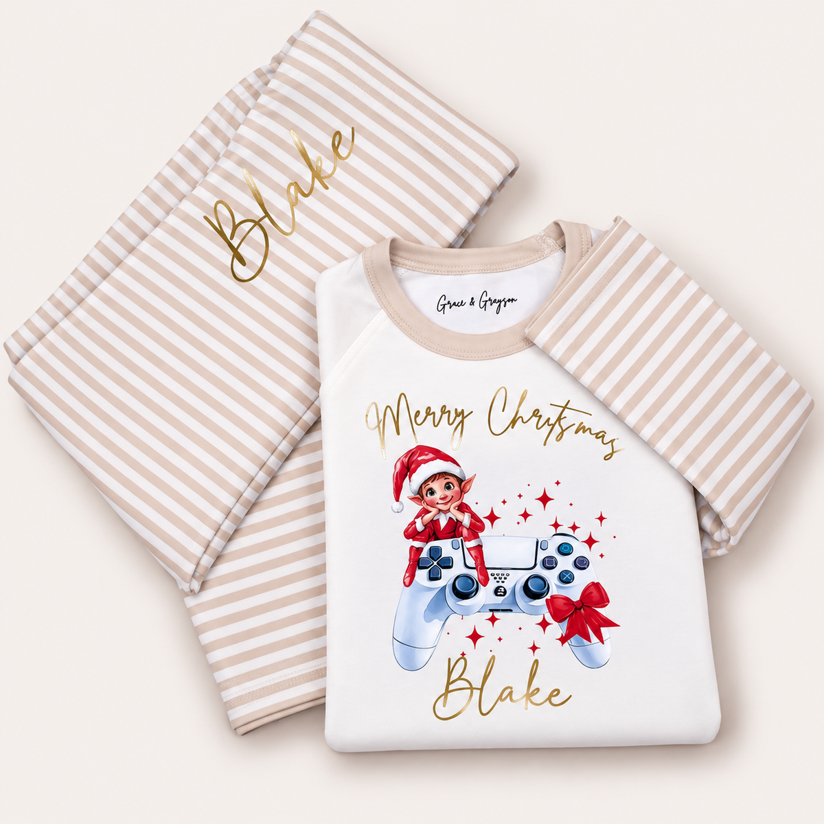 Personalised Gaming Elf Christmas pyjamas with festive elf and gaming controller design by Grace & Grayson