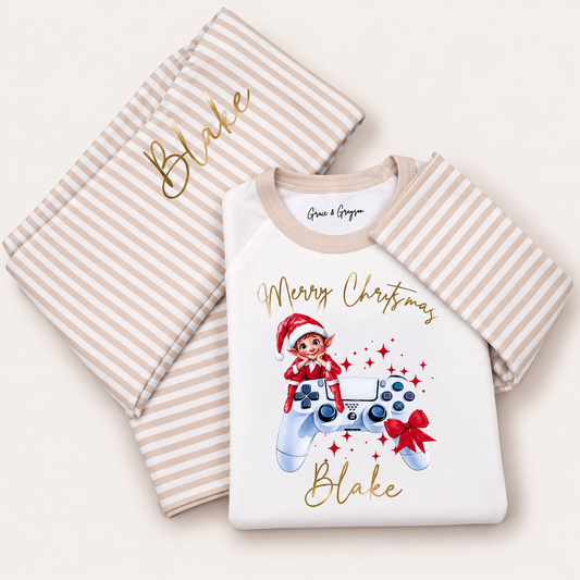 Personalised Gaming Elf Christmas pyjamas with festive elf and gaming controller design by Grace & Grayson