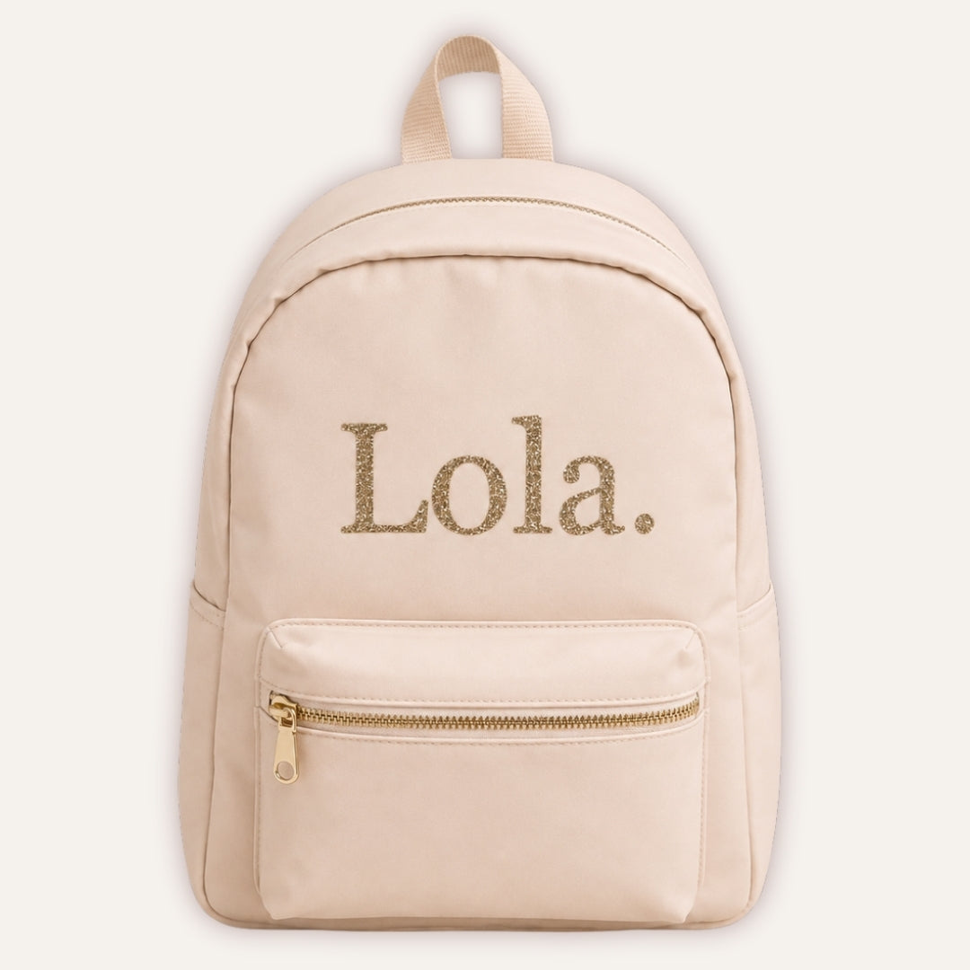 Personalised Sorbet Backpack - cream backpack with custom name in champagne glitter font by Grace & Grayson
