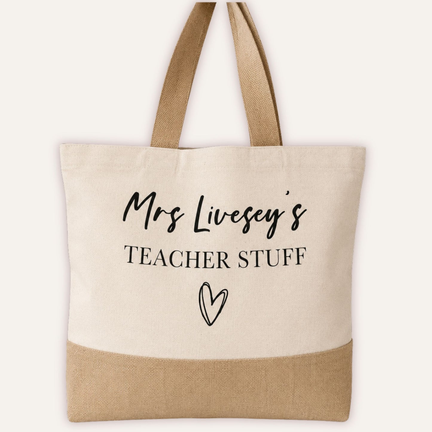 Personalised Teacher Stuff jute bag hanging, showing custom name and heart print on cream canvas with natural jute base-Grace & Grayson