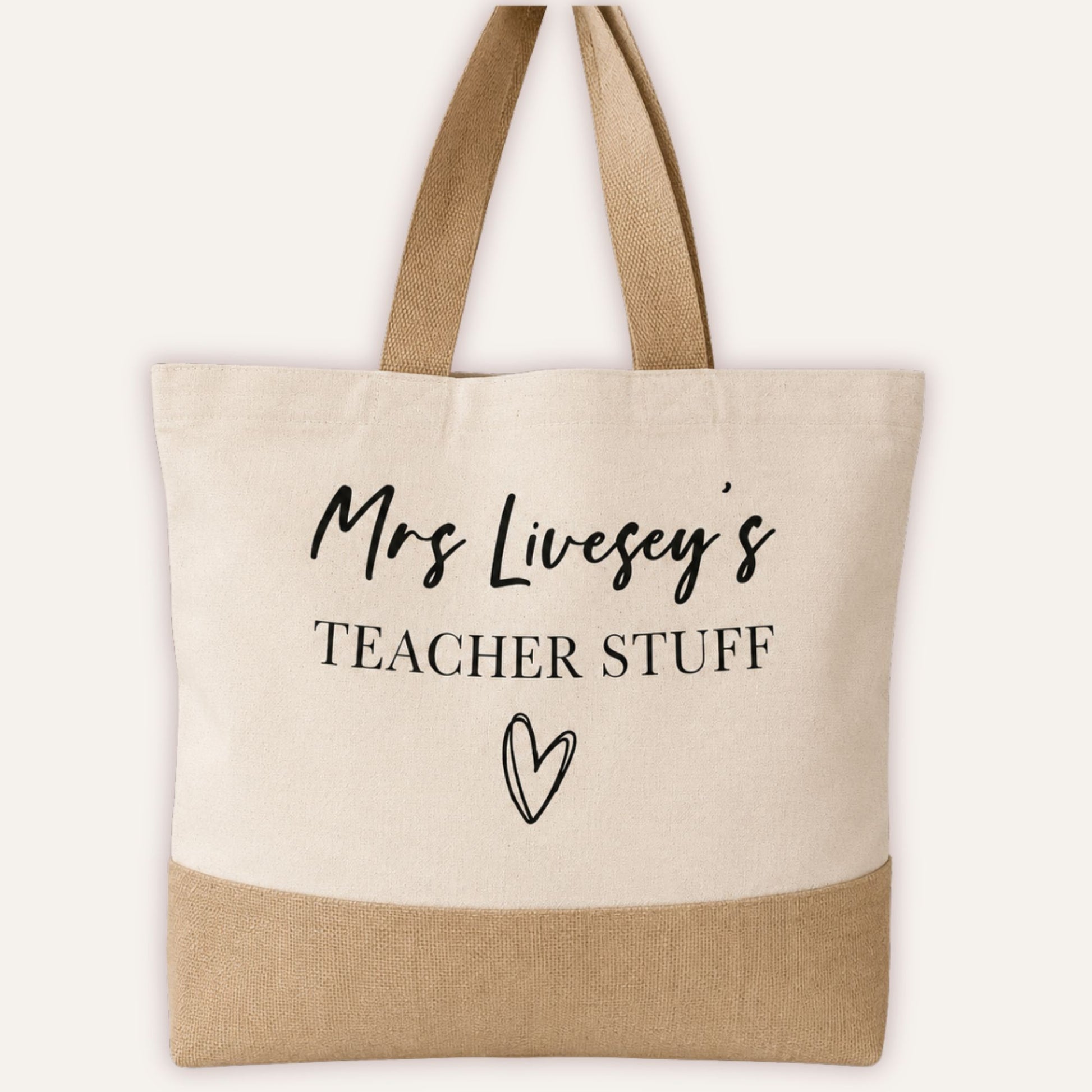 Personalised Teacher Stuff jute bag hanging, showing custom name and heart print on cream canvas with natural jute base-Grace & Grayson