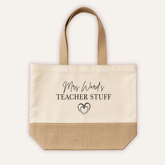 Personalised Teacher Stuff jute tote bag with custom name in script font and double heart motif, cream canvas with natural jute base and handles - Grace & Grayson