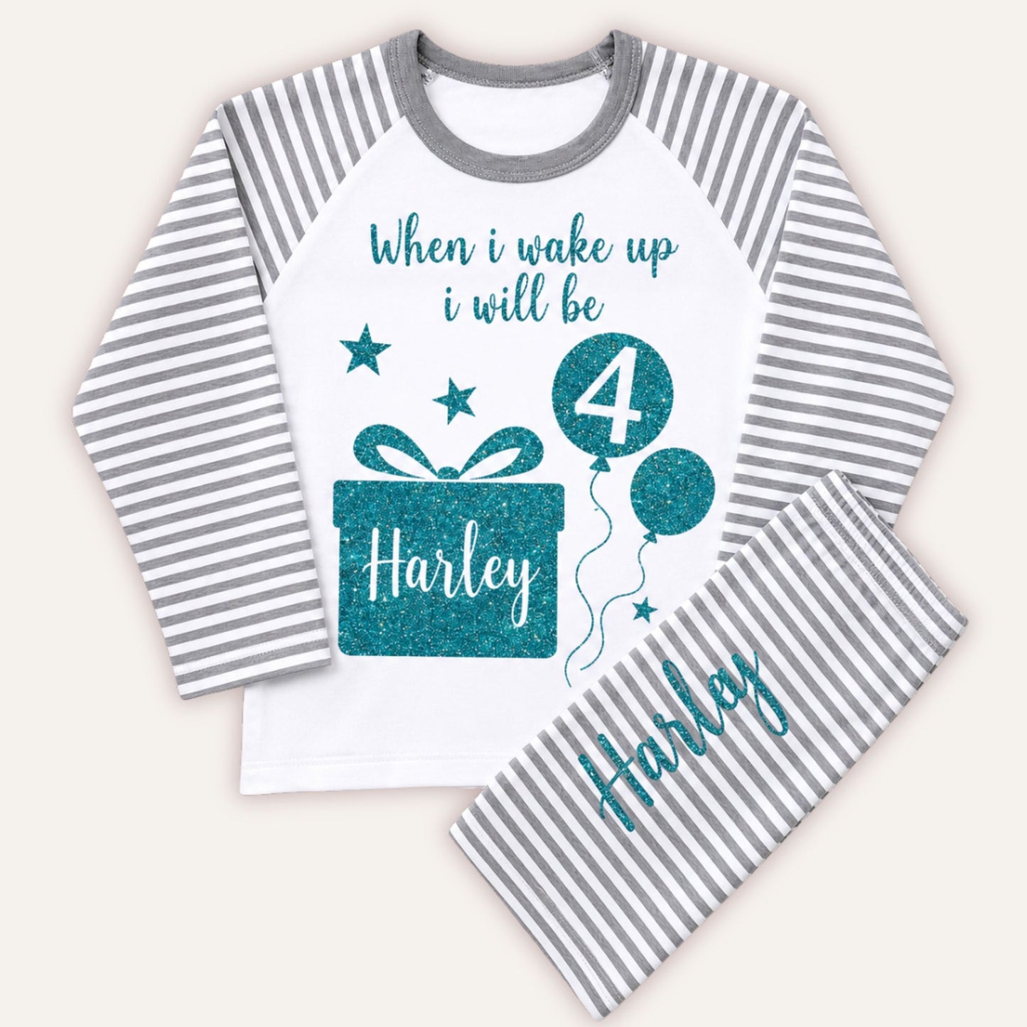 Personalised boys grey striped birthday pyjamas with blue glitter birthday design, custom name and age balloon.