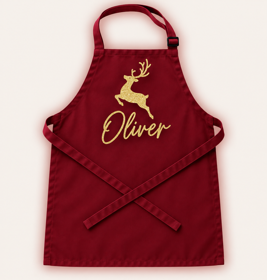 Personalised children’s Christmas apron in a festive design, Grace & Grayson