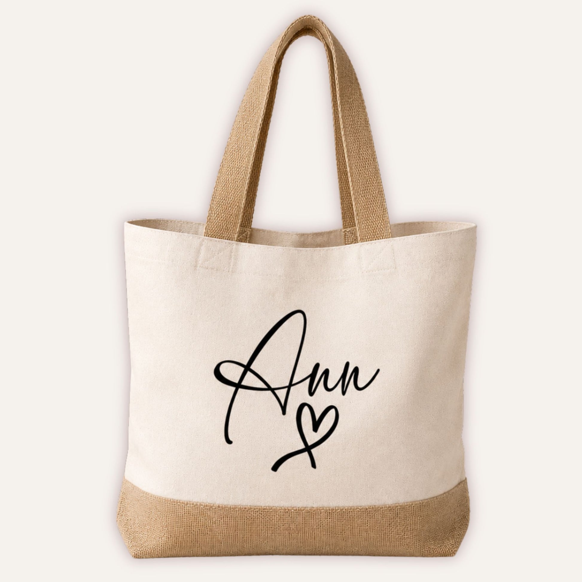 Personalised heart jute tote bag with custom name in large script font and heart design, cream canvas with natural jute base and handles | Grace & Grayson