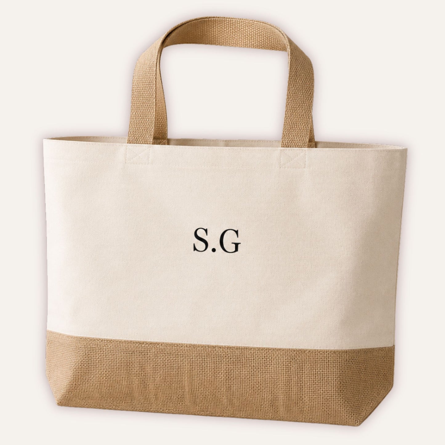 Personalised initials jute tote bag with custom monogram in classic serif font, large cream canvas bag with natural jute base panel and handles | Grace & Grayson