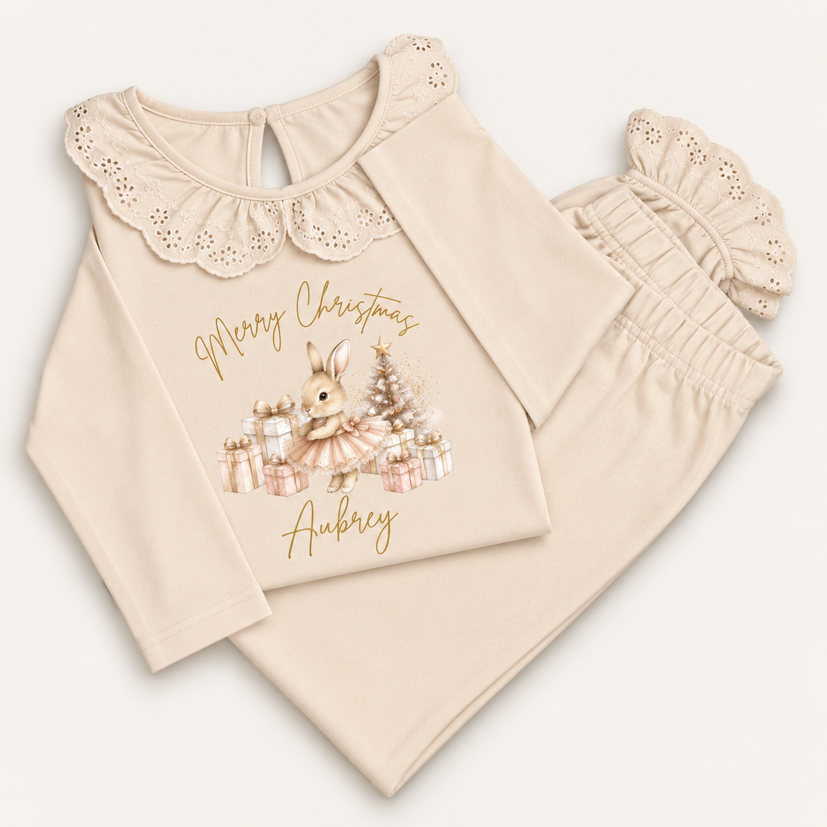 Personalised natural Christmas frill pyjamas featuring a Christmas bunny design by Grace & Grayson