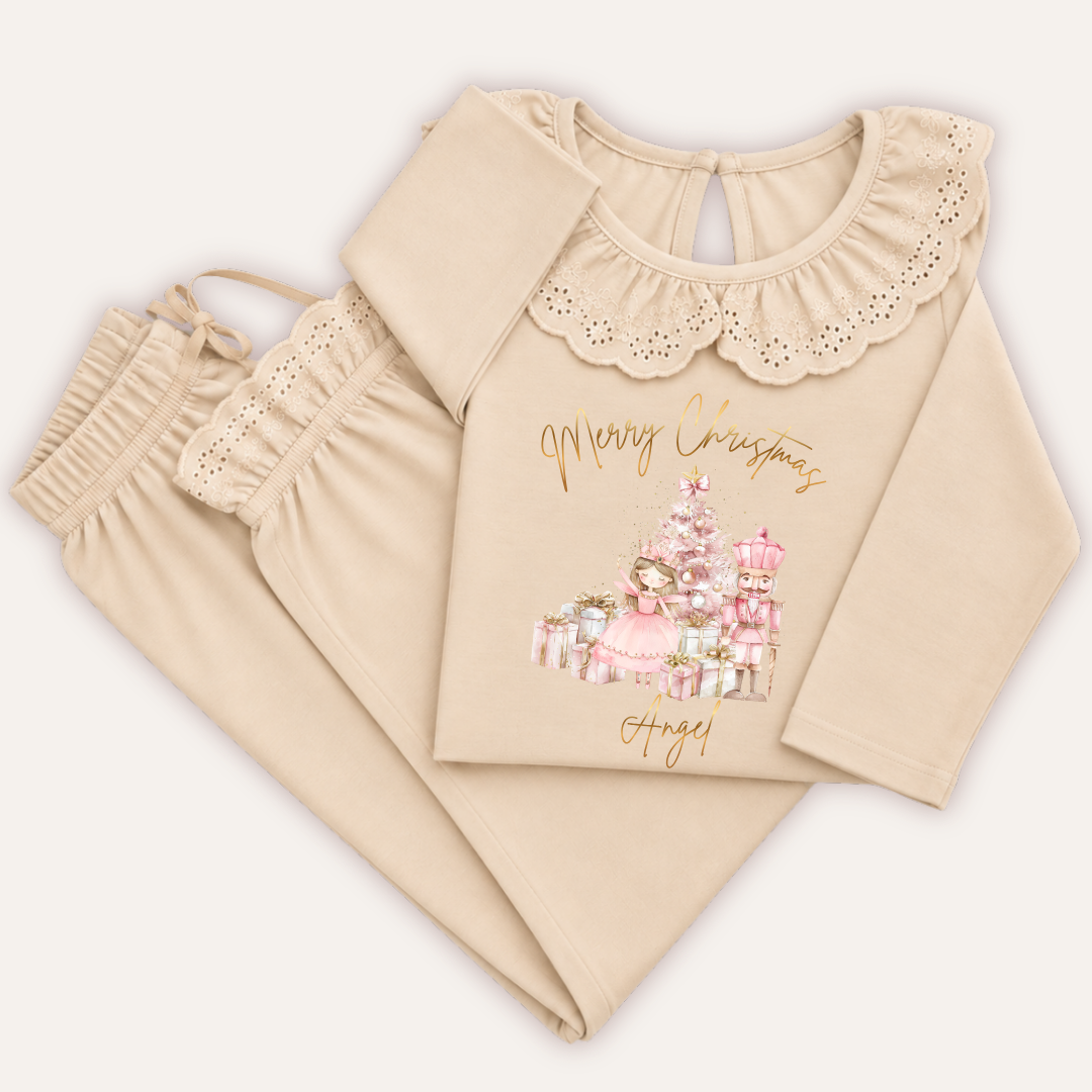 Personalised natural Christmas frill pyjamas featuring Nutcracker and Fairy design by Grace & Grayson