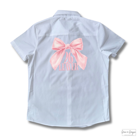 Pink bow design: "Pink Leavers Bow 2026 Shirt - Personalised signature t-shirt for school leavers"