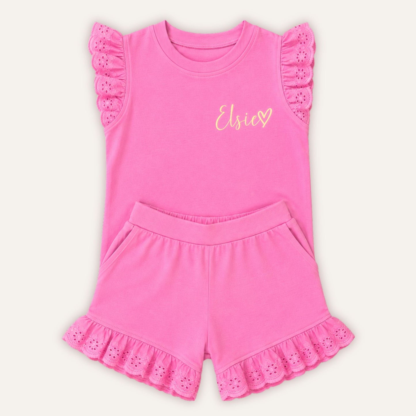 Pink broderie frill kids outfit with frill detail on shorts and sleeves – Grace & Grayson