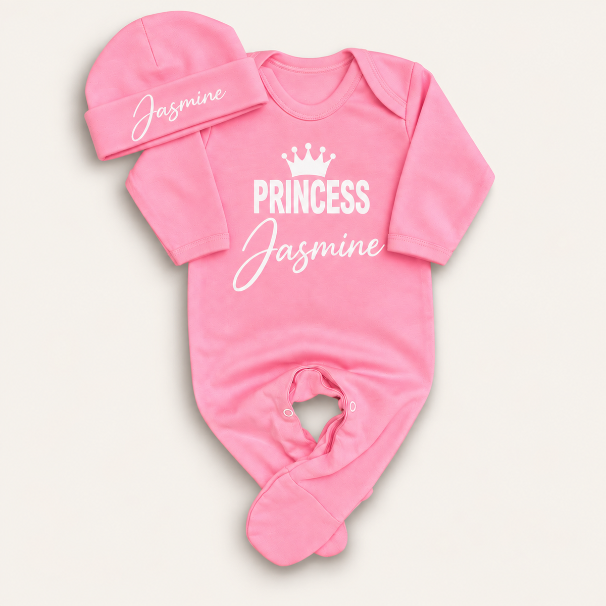 Pink personalised Princess baby grow and matching hat with white crown lettering, Grace & Grayson