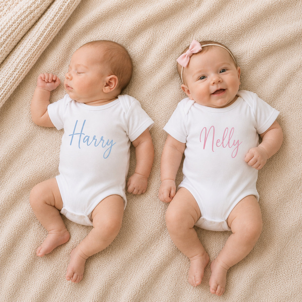 Two babies wearing personalised baby vests with custom names, Grace & Grayson