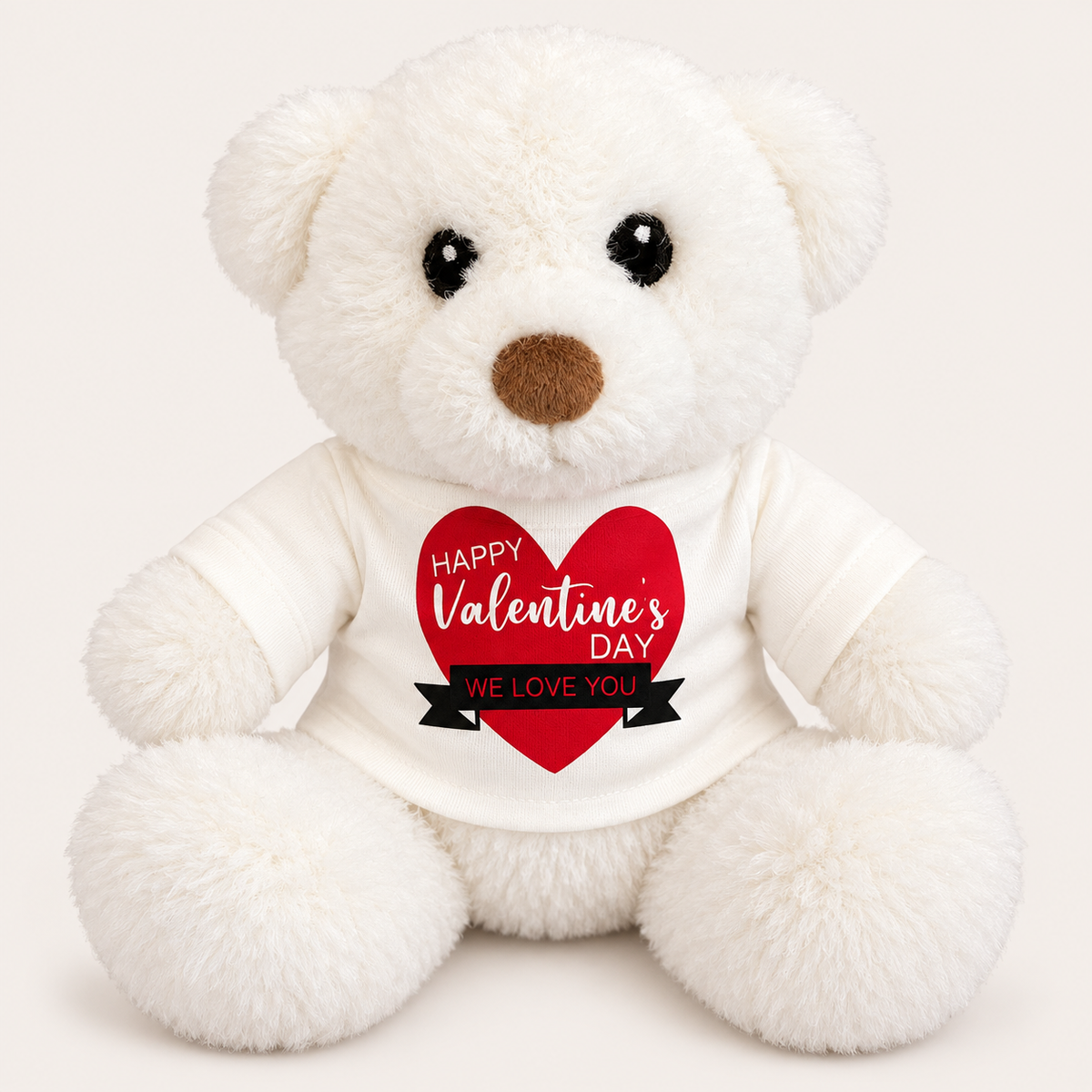 White Valentine’s Day mini teddy bear wearing a white t-shirt with a red heart design and “Happy Valentine’s Day” and “We Love You” messages, Grace & Grayson