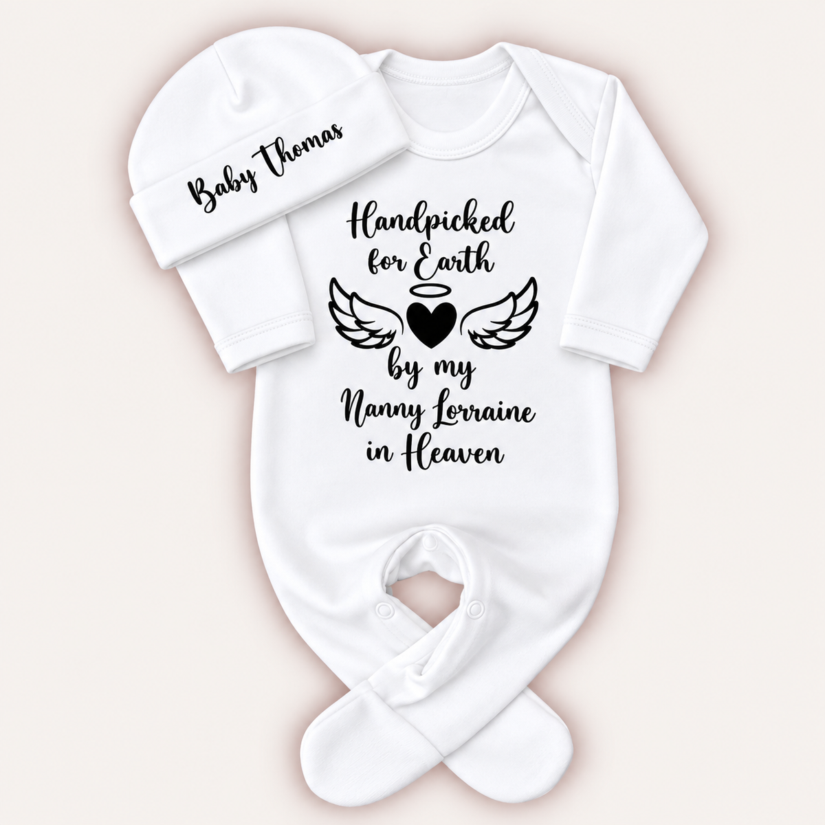 White personalised Handpicked For Earth baby grow and hat with black angel wings and heart memorial design