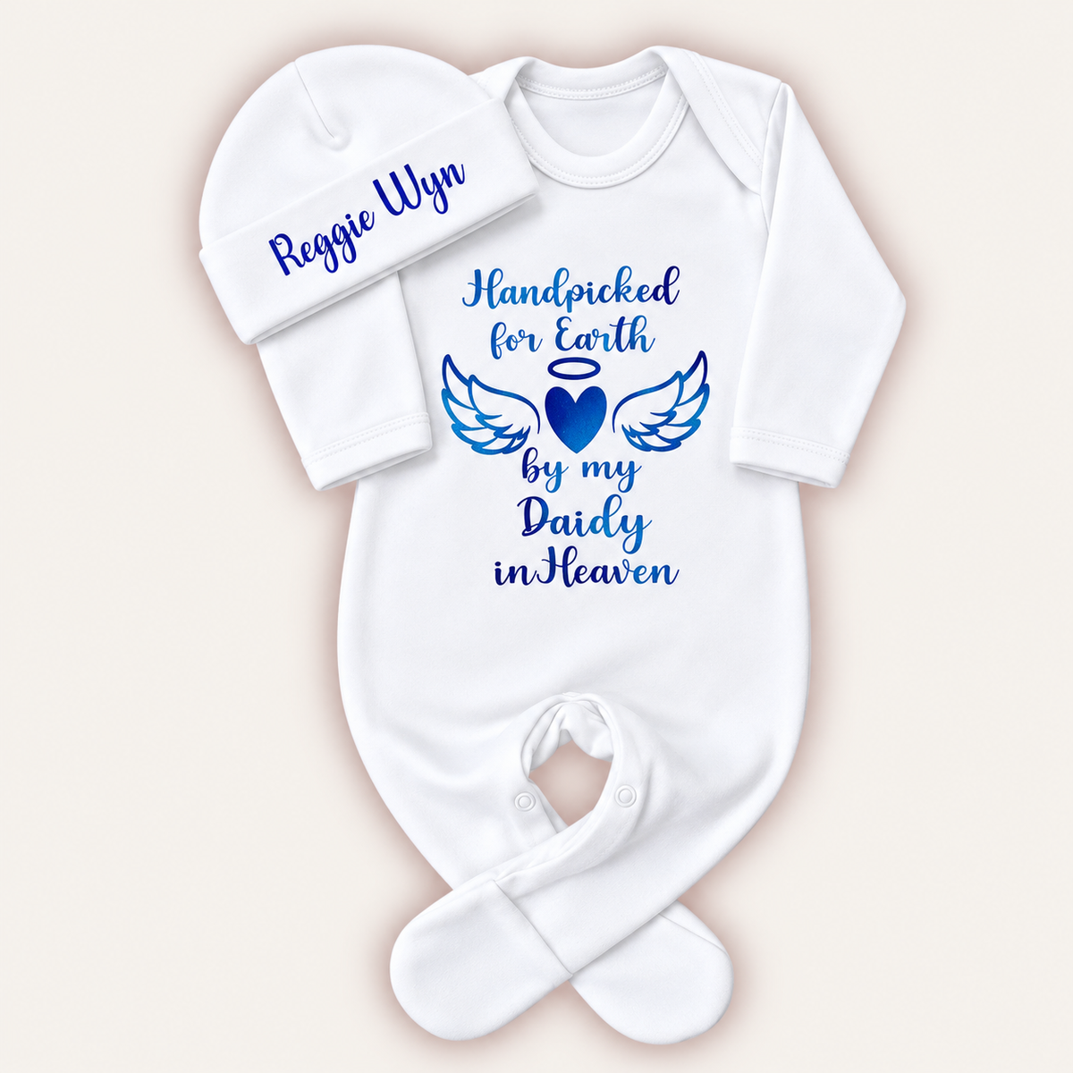 White personalised Handpicked For Earth baby grow and hat with blue angel wings and heart memorial design