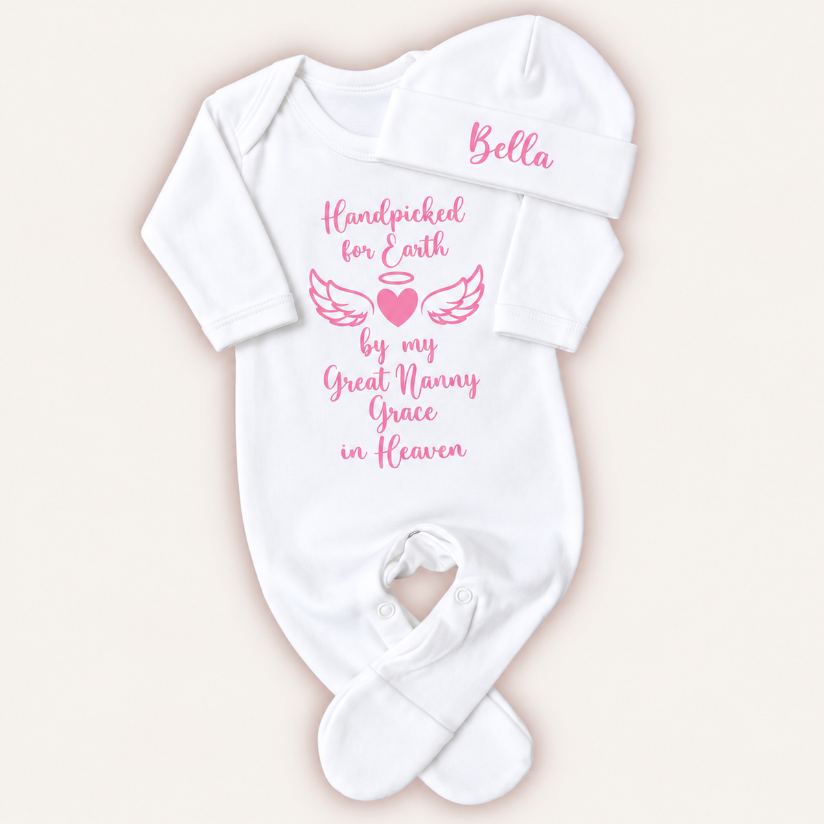 White personalised Handpicked For Earth baby grow and matching hat with pink angel wings and heart memorial design