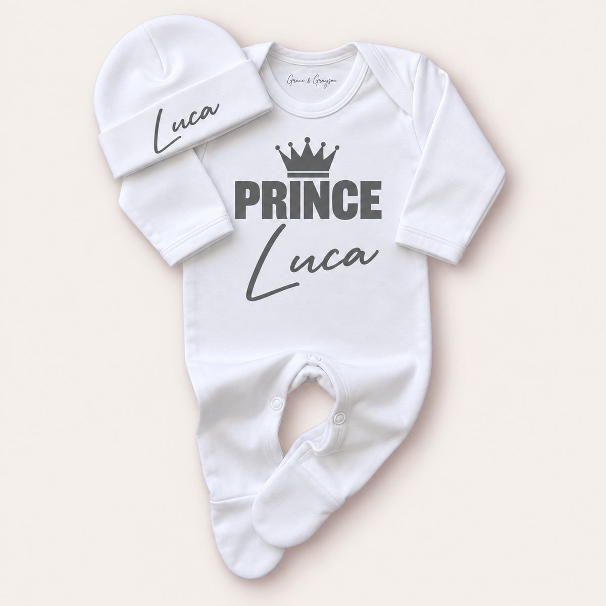 White personalised Prince baby grow and matching hat with grey crown lettering, Grace & Grayson
