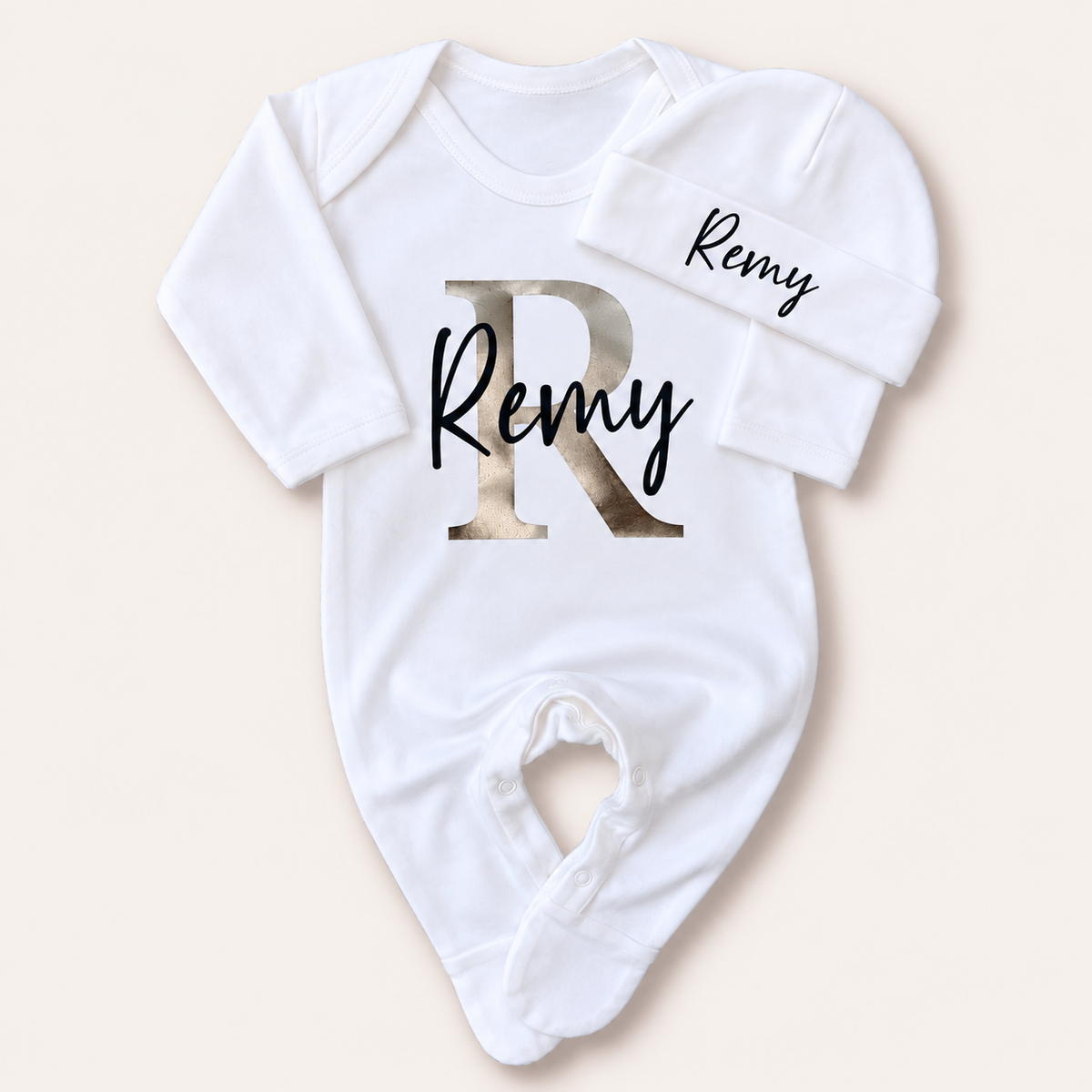 White personalised baby grow and matching hat with a large pearl initial design, Grace & Grayson