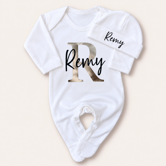 White personalised baby grow and matching hat with a large pearl initial design, Grace & Grayson