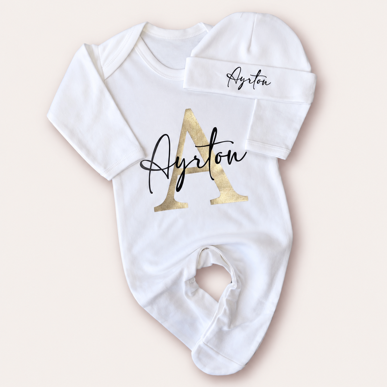 White personalised baby grow and matching hat with a pearl initial design, Grace & Grayson