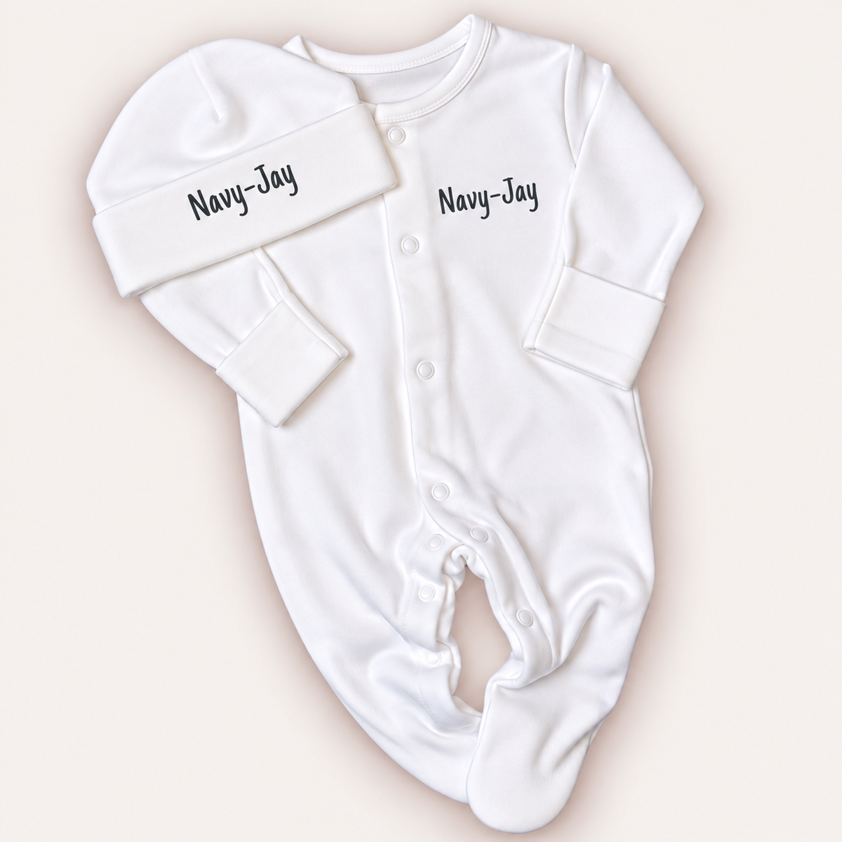 White personalised baby grow and matching hat with grey lettering, Grace & Grayson