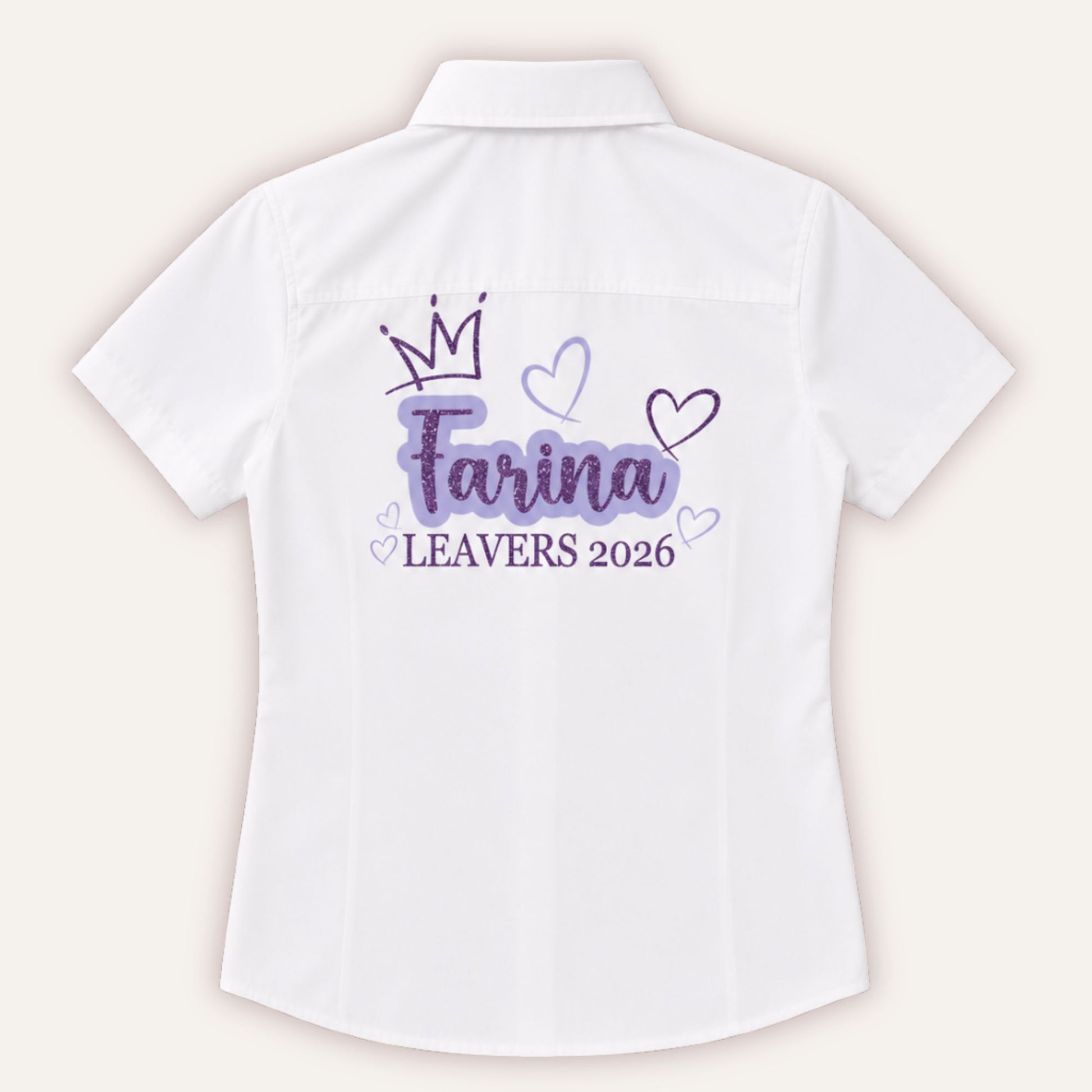 White personalised leavers shirt with glitter crown and hearts design in lilac and purple, printed with a custom name and Leavers 2026
