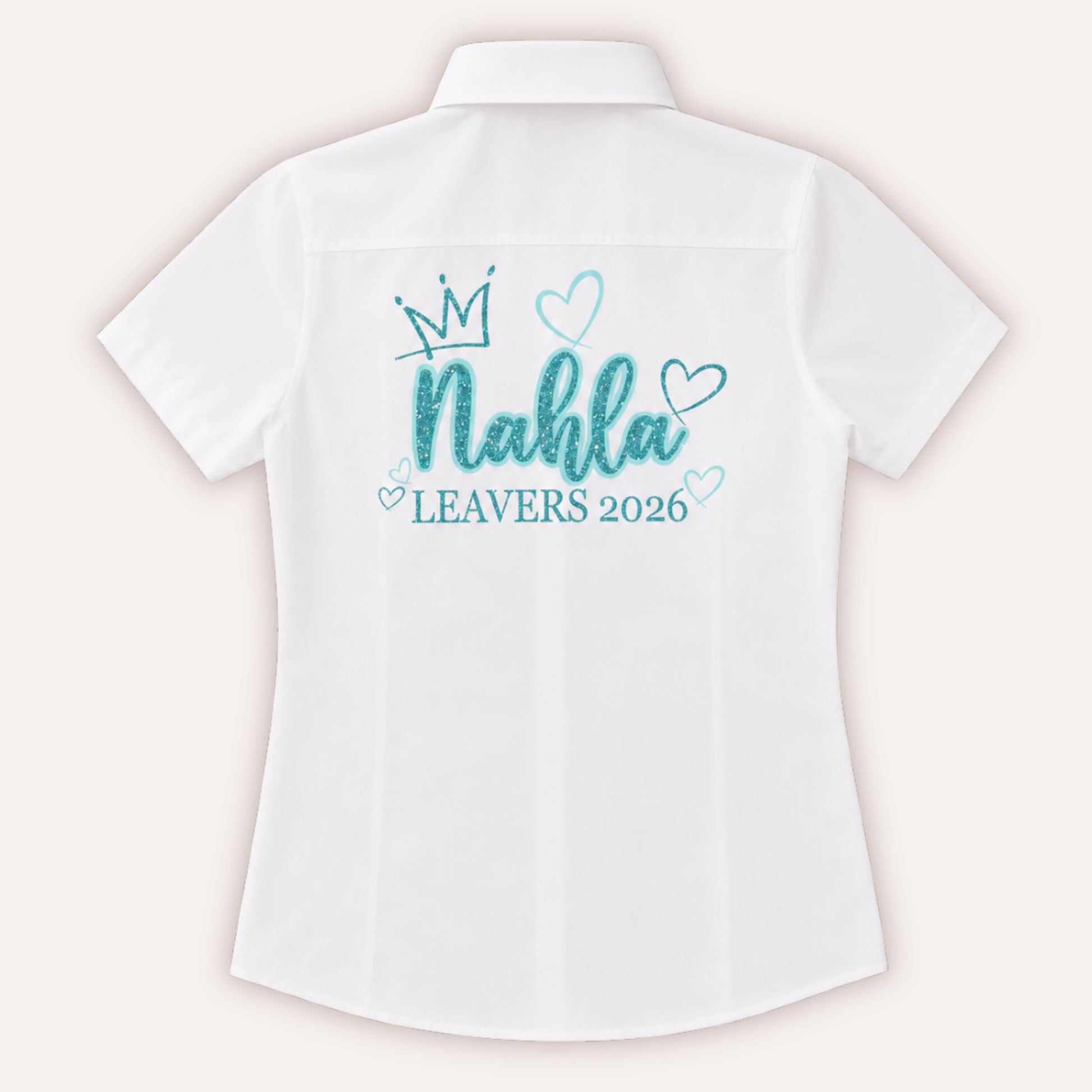 White personalised leavers shirt with glitter crown and hearts design in turquoise and light blue glitter, printed with a custom name and Leavers 2026