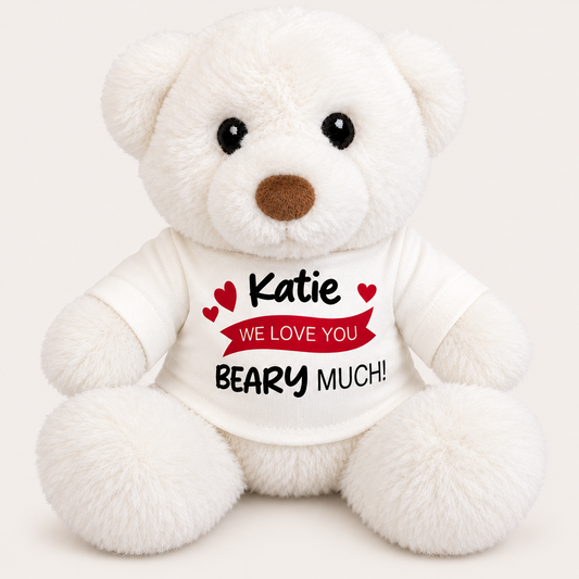 White personalised teddy bear wearing a white t-shirt with red heart details and a “We Love You Beary Much” message, Grace & Grayson
