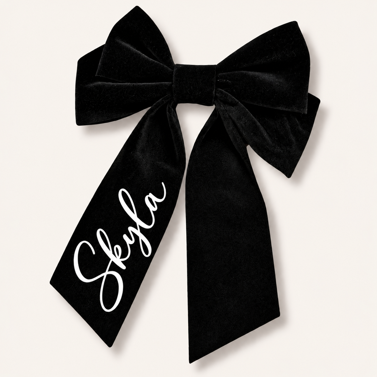 Large black velvet hair bow with long tails and white personalised lettering, Grace & Grayson.
