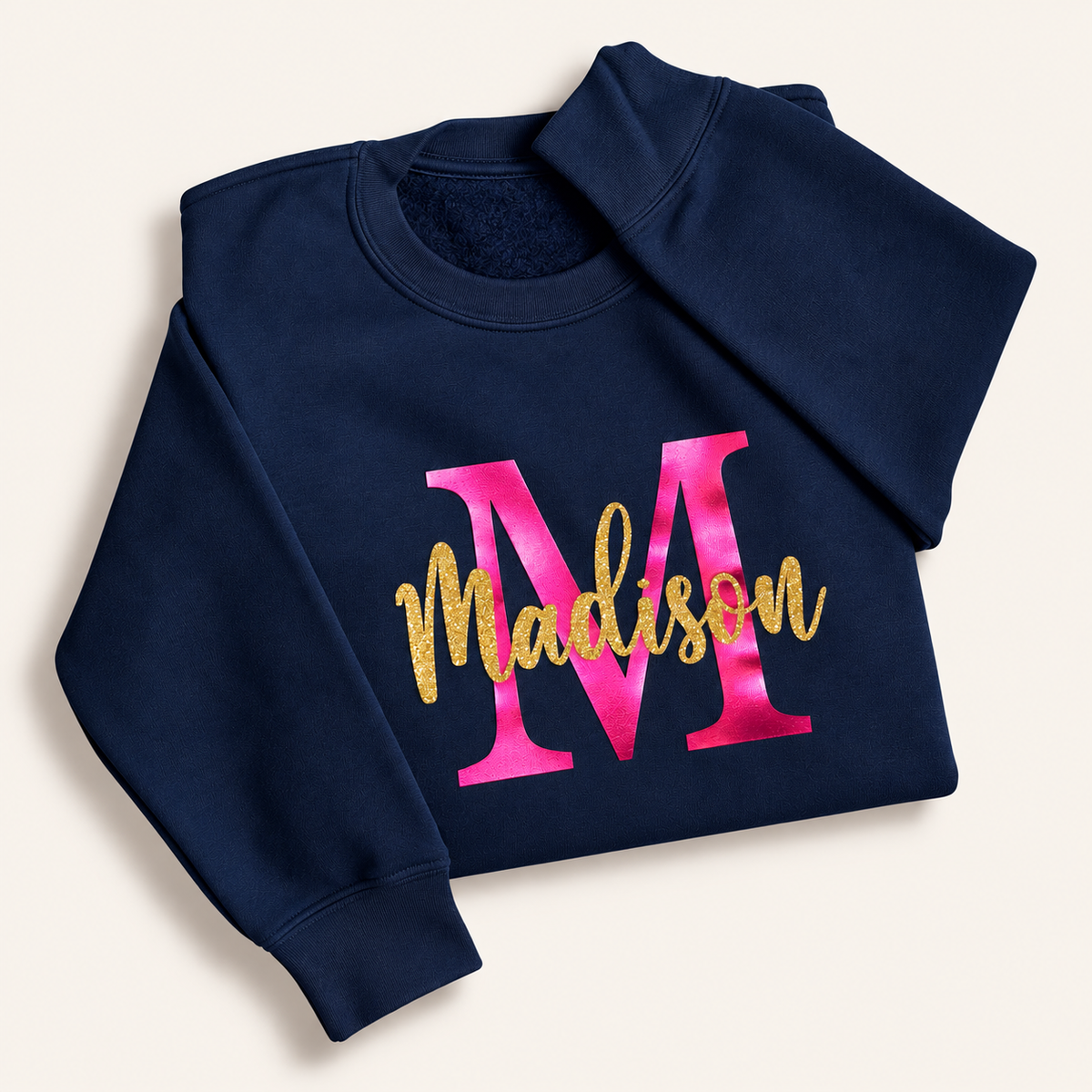 Navy personalised sweatshirt with a pink pearl initial and gold glitter script name | Grace & Grayson