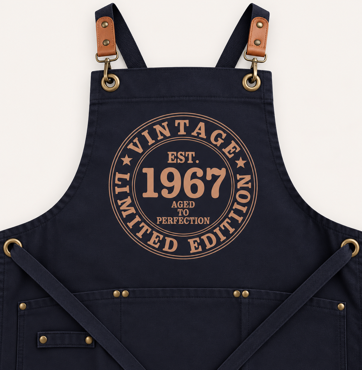 Close-up of navy personalised Vintage Limited Edition apron with a Vintage 1967 year design, Grace & Grayson
